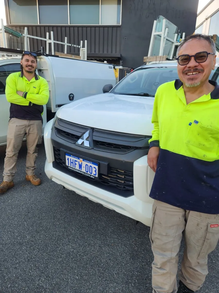 The Pro Glazier Perth team beside their work ute in Perth